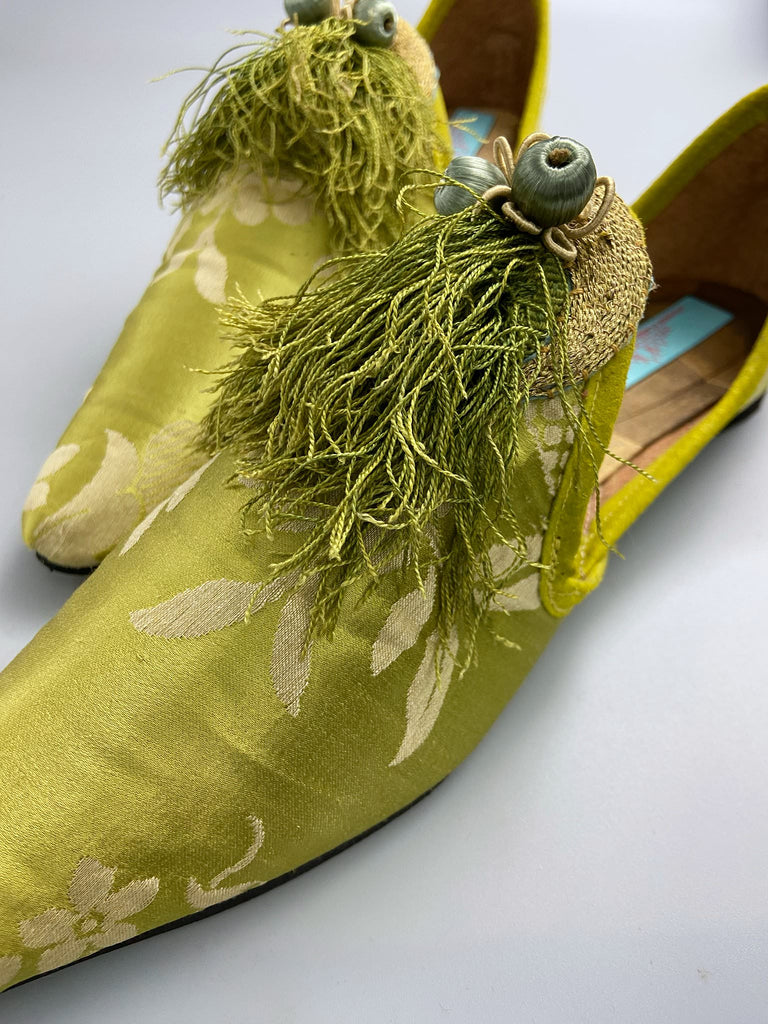 Green chartreuse silk damask pointed toe shoes with tassel fringe and gold Ottoman embroidered crescents. Bohemian styles sustainably created from antique textiles by the Pavilion Parade studio. 