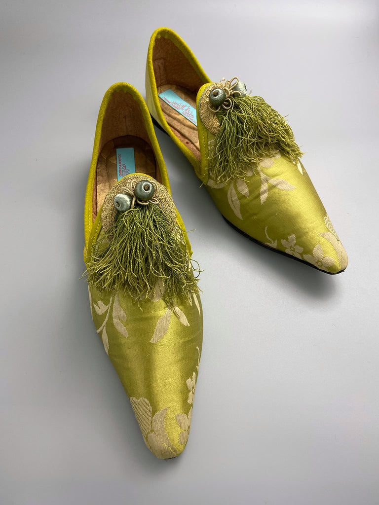 Green chartreuse silk damask pointed toe shoes with tassel fringe and gold Ottoman embroidered crescents. Bohemian styles sustainably created from antique textiles by the Pavilion Parade studio. 