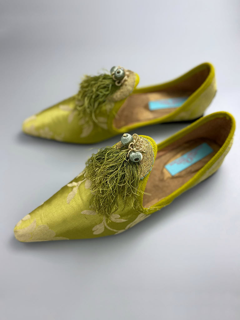 Green chartreuse silk damask pointed toe shoes with tassel fringe and gold Ottoman embroidered crescents. Bohemian styles sustainably created from antique textiles by the Pavilion Parade studio. 