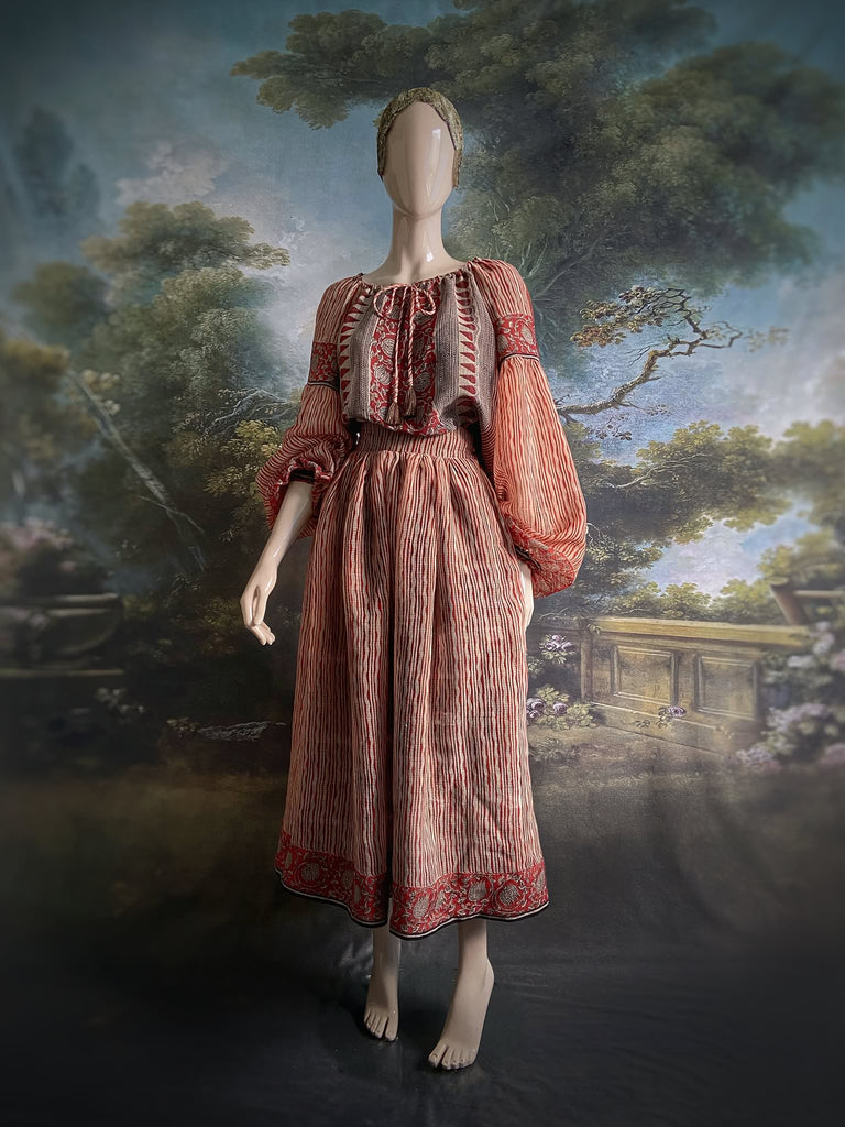 Fine semi sheer pure cotton block printed summer ensemble in cinnamon, black and ivory palette. Full sleeved peasant blouse and full dirndl skirt. Bohemian styles created from vintage textiles by Pavilion parade studio. 