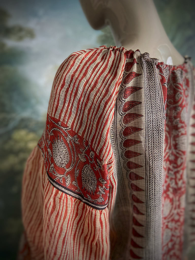 Fine semi sheer pure cotton block printed summer ensemble in cinnamon, black and ivory palette. Full sleeved peasant blouse and full dirndl skirt. Bohemian styles created from vintage textiles by Pavilion parade studio. 