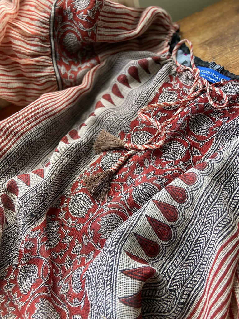 Fine semi sheer pure cotton block printed summer ensemble in cinnamon, black and ivory palette. Full sleeved peasant blouse and full dirndl skirt. Bohemian styles created from vintage textiles by Pavilion parade studio. 