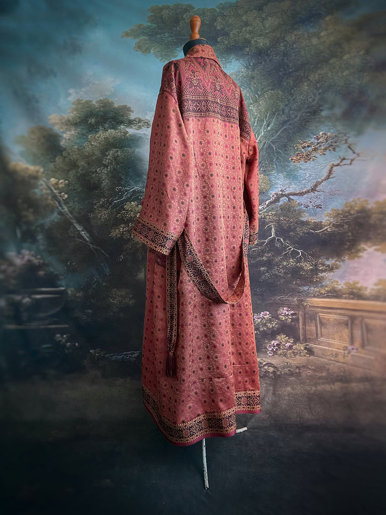 Cinnamon, pumpkin, and soot silk and wool robe with wide sleeves, tassel sash, and deep pockets. Unique bohemian styles sustainably created from vintage textiles by the Pavilion Parade studio.