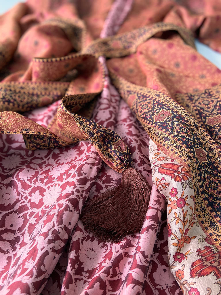 Cinnamon, pumpkin, and soot silk and wool robe with wide sleeves, tassel sash, and deep pockets. Unique bohemian styles sustainably created from vintage textiles by the Pavilion Parade studio.