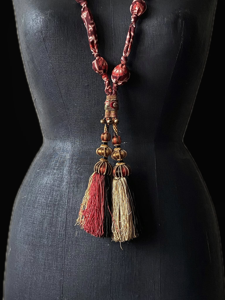 Aesthetic Movement inspired long silk sautoir necklace with antique tassel embellishment. Bohemian style from vintage textiles by Pavilion Parade. 