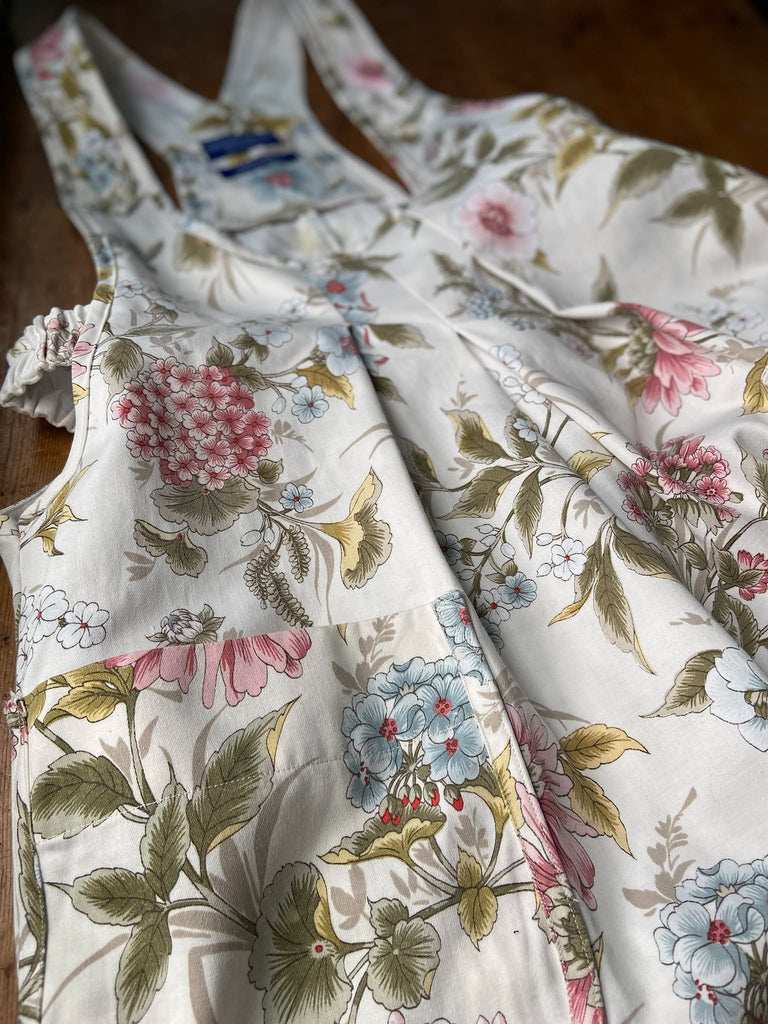 Romantic cottage garden overalls created from vintage deadstock floral cotton. Bohemian style from antique textiles by the Pavilion Parade studio.