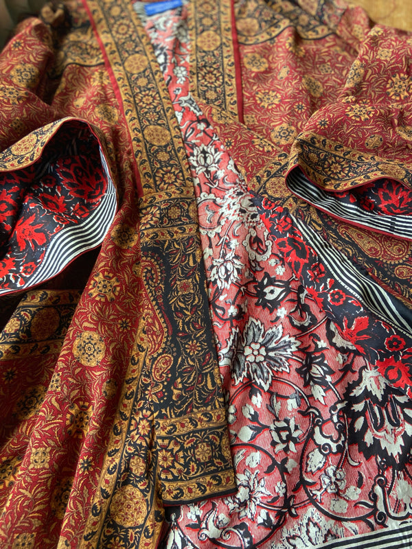 1920s inspired silk kimono robe created from vintage black, mustard, and dark sienna red silk crepe. Unique bohemian designs from the Pavilion Parade studio.