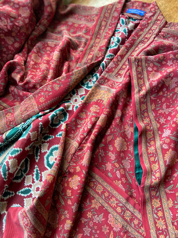 Full length 1920s inspired kimono robe with large patch pockets. Newly created from a claret red, apricot and sage vintage silk crepe. Fully lined in silk with French seams throughout. Bohemian styles sustainably created from antique and vintage textiles by the Pavilion Parade studio.