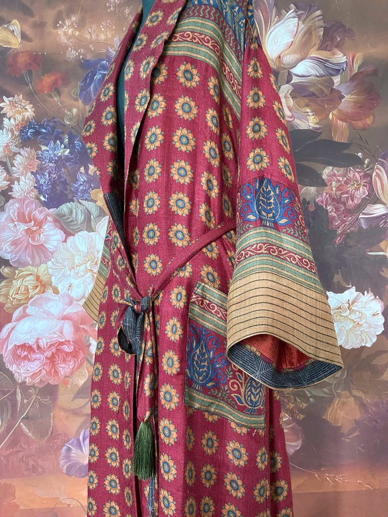 Dark claret red and sapphire blue fine wool luxury dressing robe. Lined in silk and sustainably created from antique and vintage textiles by the Pavilion Parade studio.