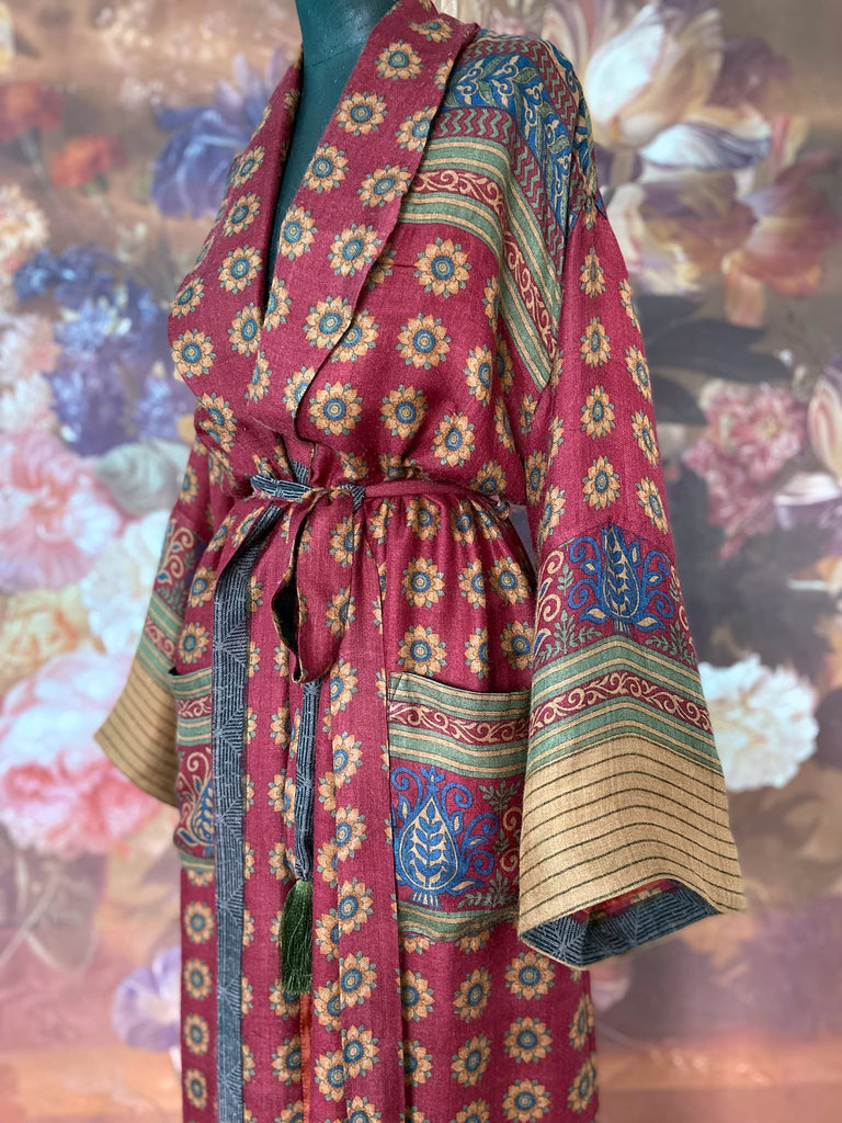 Dark claret red and sapphire blue fine wool luxury dressing robe. Lined in silk and sustainably created from antique and vintage textiles by the Pavilion Parade studio.