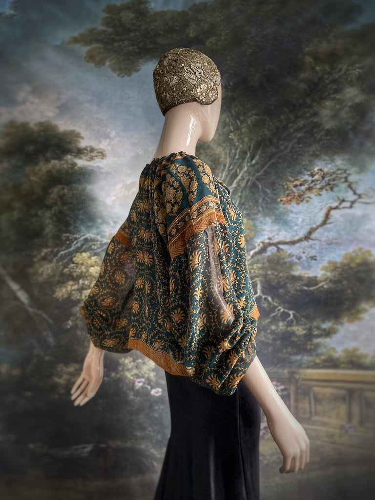 Dark teal green and ochre silk georgette blouse with long full sleeves and adjustable drawstring neckline. Bohemian styles sustainably created from antique and vintage textiles by the Pavilion Parade studio. 