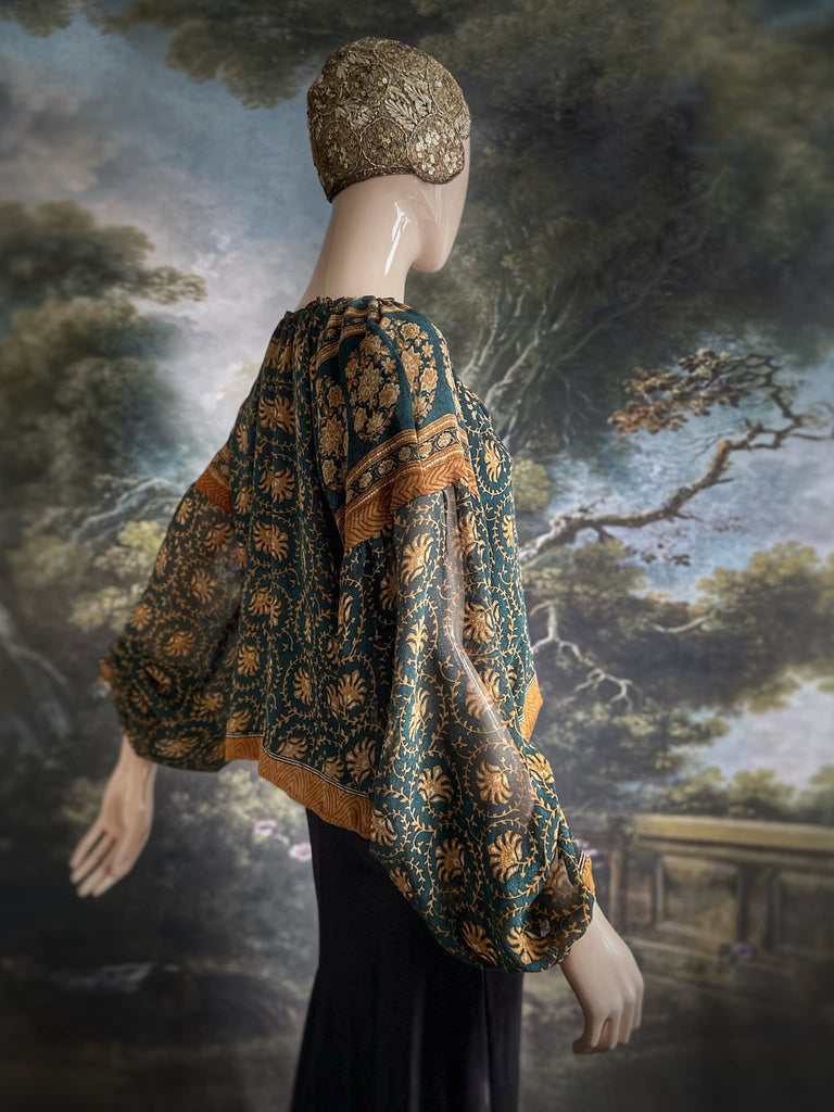 Dark teal green and ochre silk georgette blouse with long full sleeves and adjustable drawstring neckline. Bohemian styles sustainably created from antique and vintage textiles by the Pavilion Parade studio. 