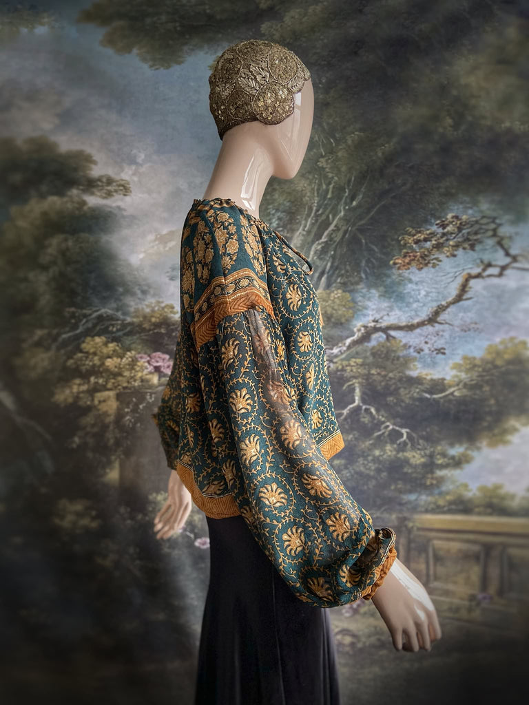 Dark teal green and ochre silk georgette blouse with long full sleeves and adjustable drawstring neckline. Bohemian styles sustainably created from antique and vintage textiles by the Pavilion Parade studio. 