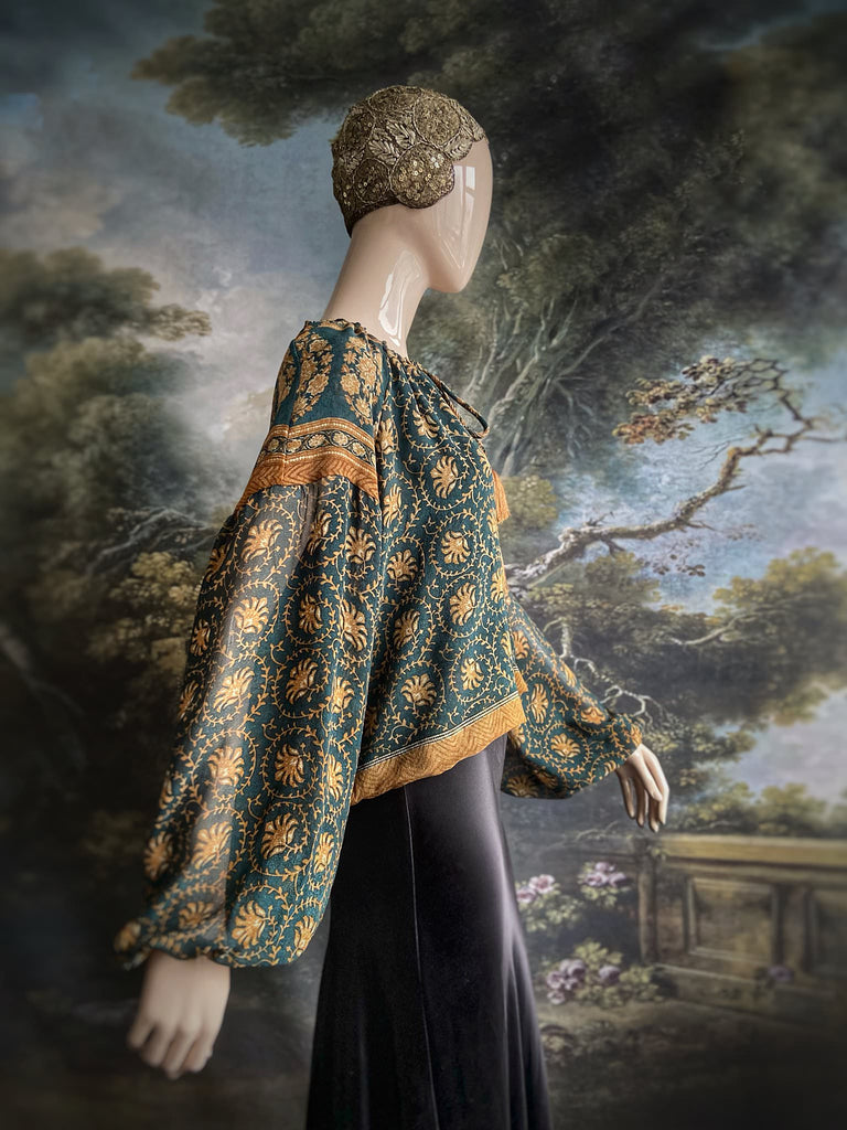 Dark teal green and ochre silk georgette blouse with long full sleeves and adjustable drawstring neckline. Bohemian styles sustainably created from antique and vintage textiles by the Pavilion Parade studio. 