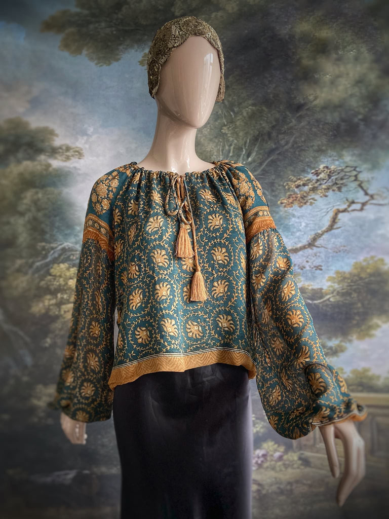 Dark teal green and ochre silk georgette blouse with long full sleeves and adjustable drawstring neckline. Bohemian styles sustainably created from antique and vintage textiles by the Pavilion Parade studio. 