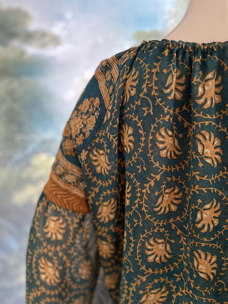 Dark teal green and ochre silk georgette blouse with long full sleeves and adjustable drawstring neckline. Bohemian styles sustainably created from antique and vintage textiles by the Pavilion Parade studio. 