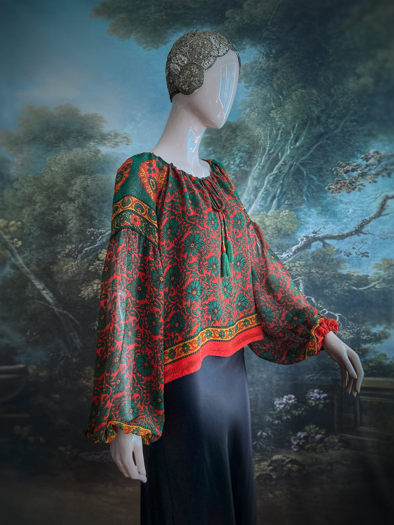 Emerald, paprika and sunflower yellow silk georgette blouse with long full sleeves and adjustable drawstring neckline. Bohemian styles sustainably created from antique and vintage textiles by the Pavilion Parade studio. 