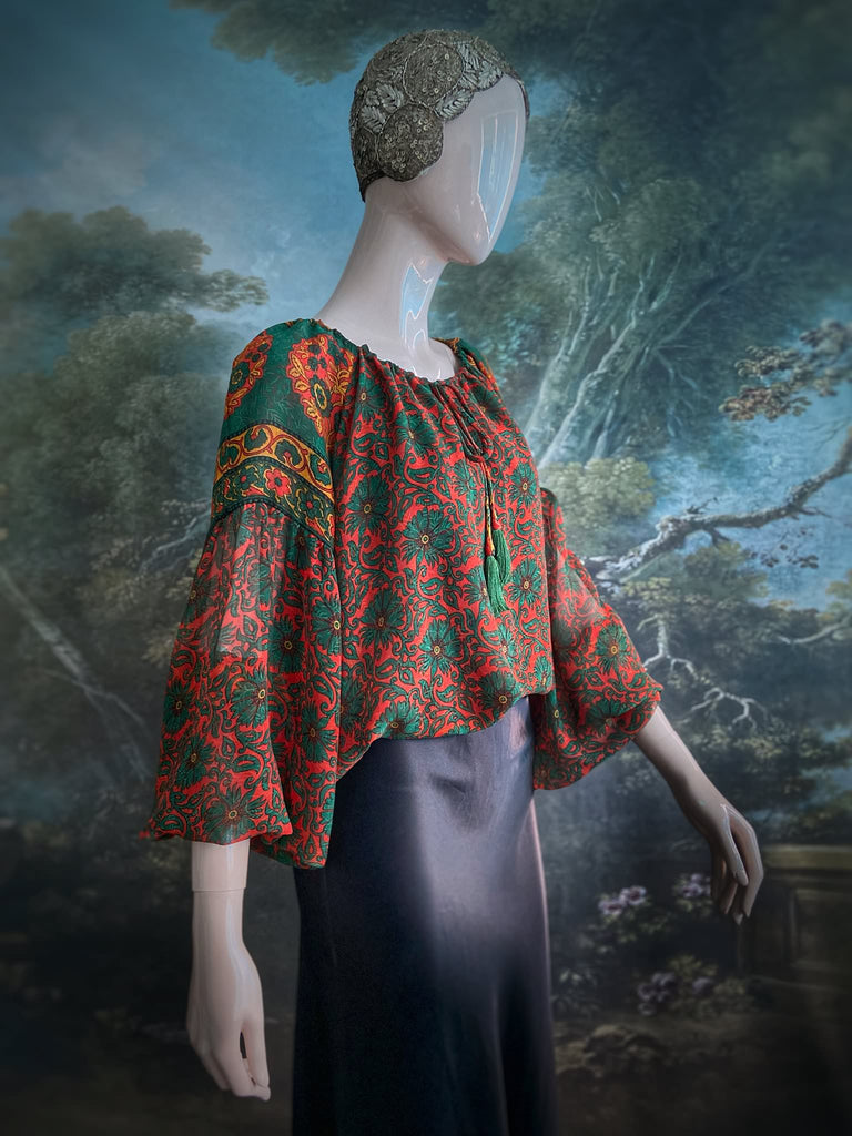 Emerald, paprika and sunflower yellow silk georgette blouse with long full sleeves and adjustable drawstring neckline. Bohemian styles sustainably created from antique and vintage textiles by the Pavilion Parade studio. 