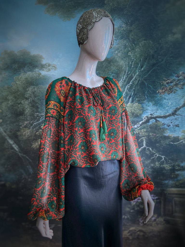 Emerald, paprika and sunflower yellow silk georgette blouse with long full sleeves and adjustable drawstring neckline. Bohemian styles sustainably created from antique and vintage textiles by the Pavilion Parade studio. 