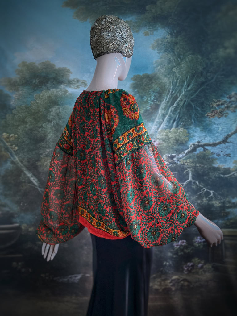 Emerald, paprika and sunflower yellow silk georgette blouse with long full sleeves and adjustable drawstring neckline. Bohemian styles sustainably created from antique and vintage textiles by the Pavilion Parade studio. 