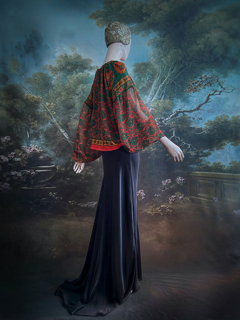 Emerald, paprika and sunflower yellow silk georgette blouse with long full sleeves and adjustable drawstring neckline. Bohemian styles sustainably created from antique and vintage textiles by the Pavilion Parade studio. 