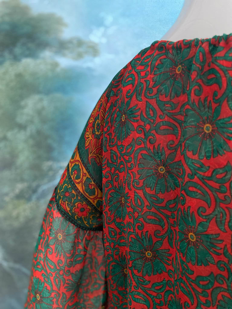 Emerald, paprika and sunflower yellow silk georgette blouse with long full sleeves and adjustable drawstring neckline. Bohemian styles sustainably created from antique and vintage textiles by the Pavilion Parade studio. 