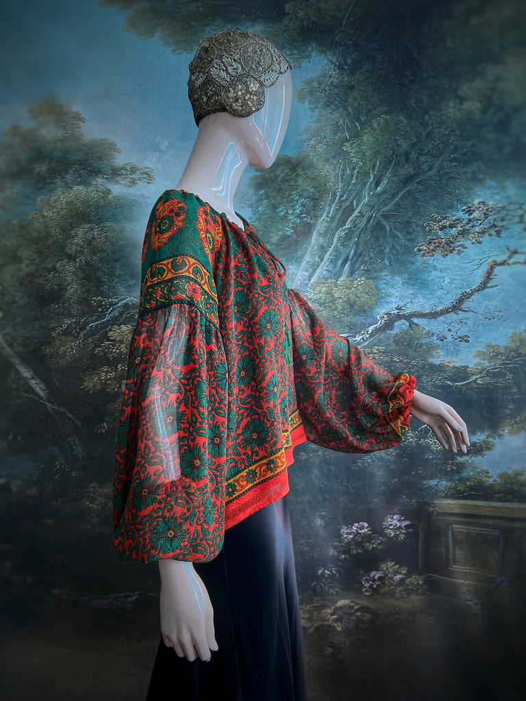 Emerald, paprika and sunflower yellow silk georgette blouse with long full sleeves and adjustable drawstring neckline. Bohemian styles sustainably created from antique and vintage textiles by the Pavilion Parade studio. 