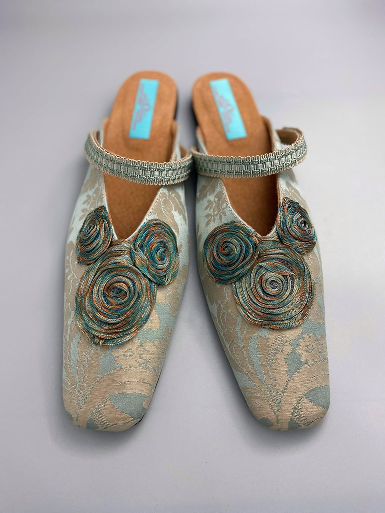 Duck egg blue and bronze square toed silk damask shoes with silk ribbon roundels and graid straps. Bohemian styles sustainably created from antique textiles by the Pavilion Parade studio.