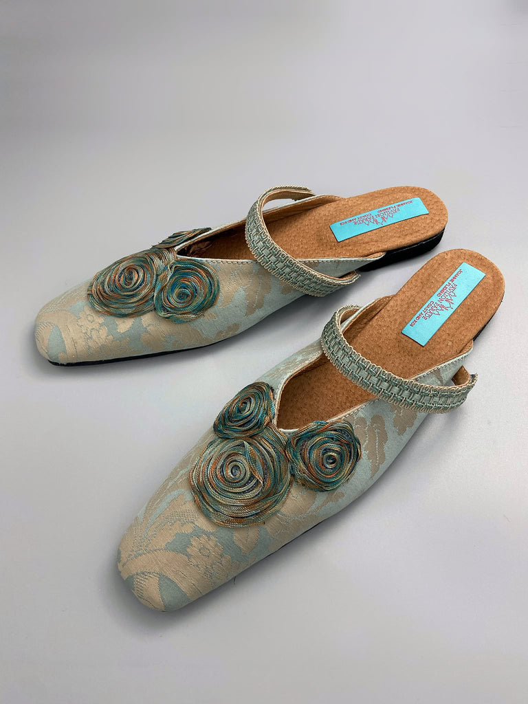 Duck egg blue and bronze square toed silk damask shoes with silk ribbon roundels and graid straps. Bohemian styles sustainably created from antique textiles by the Pavilion Parade studio.