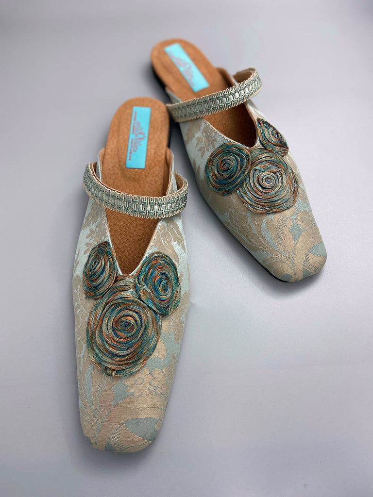 Duck egg blue and bronze square toed silk damask shoes with silk ribbon roundels and graid straps. Bohemian styles sustainably created from antique textiles by the Pavilion Parade studio.