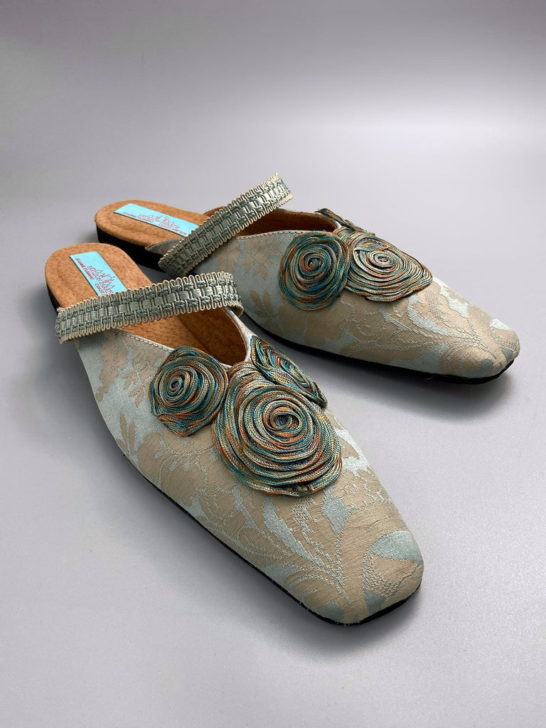 Duck egg blue and bronze square toed silk damask shoes with silk ribbon roundels and graid straps. Bohemian styles sustainably created from antique textiles by the Pavilion Parade studio.