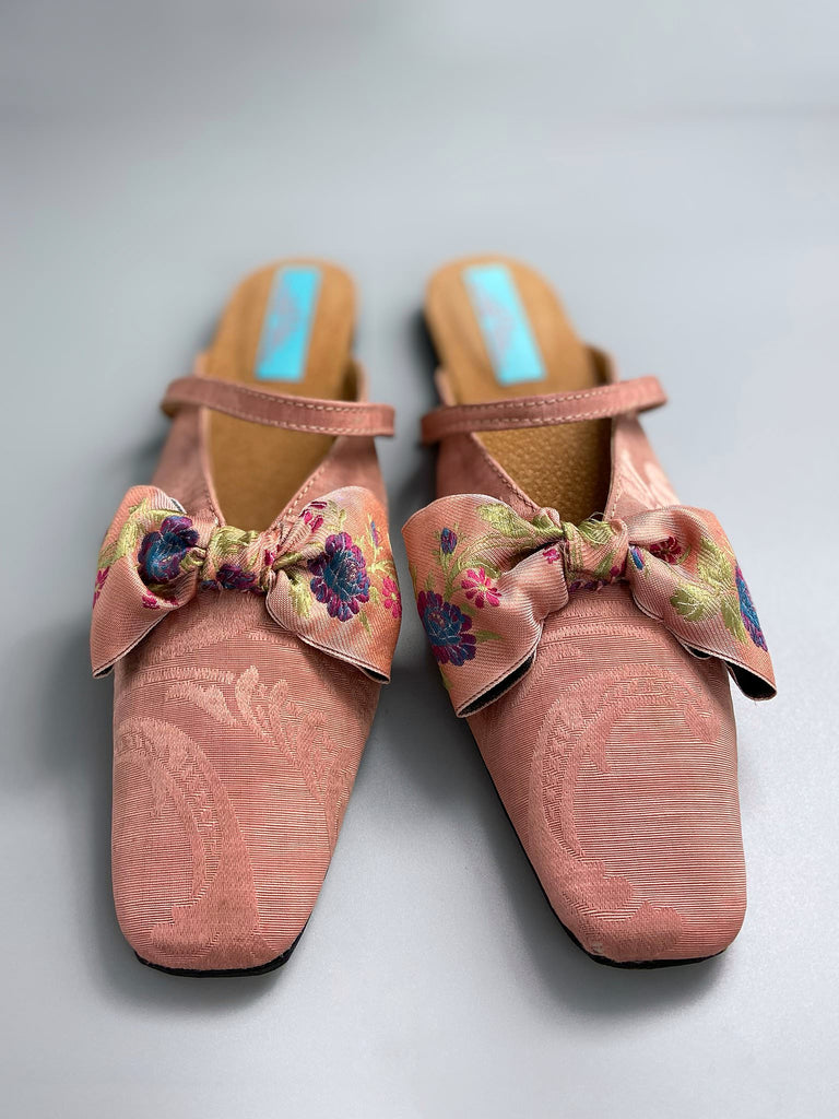 Salmon pink square toed silk damask shoes with floral ribbon bows. Bohemian styles created from antique textiles by the Pavilion Parade studio.