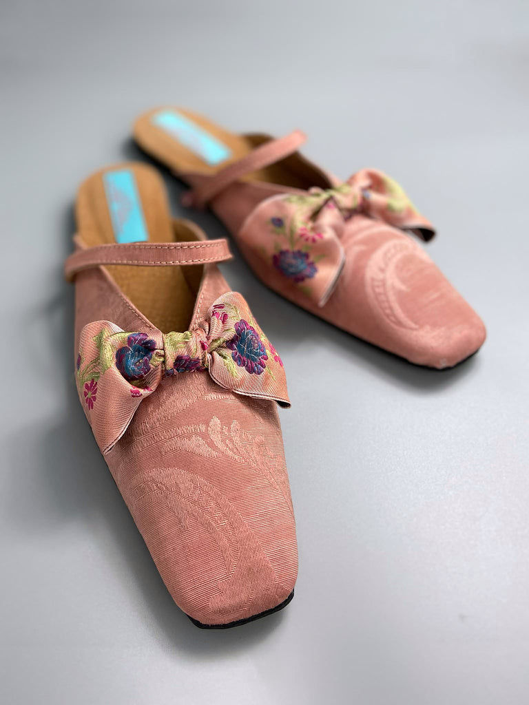 Salmon pink square toed silk damask shoes with floral ribbon bows. Bohemian styles created from antique textiles by the Pavilion Parade studio.