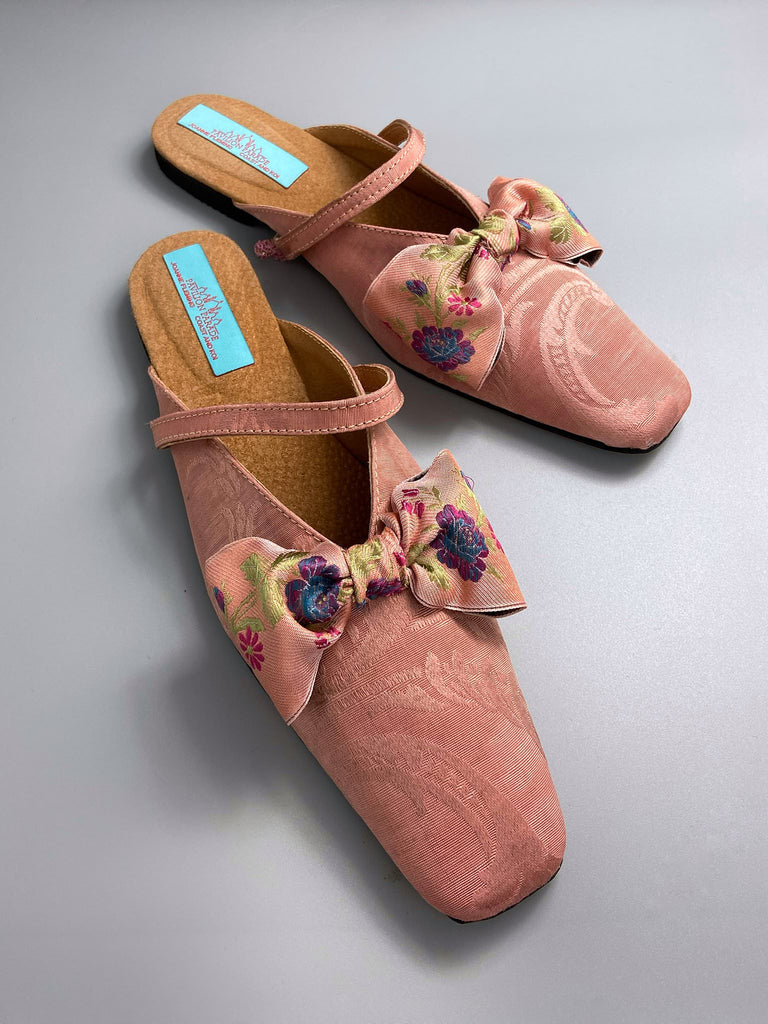 Salmon pink square toed silk damask shoes with floral ribbon bows. Bohemian styles created from antique textiles by the Pavilion Parade studio.