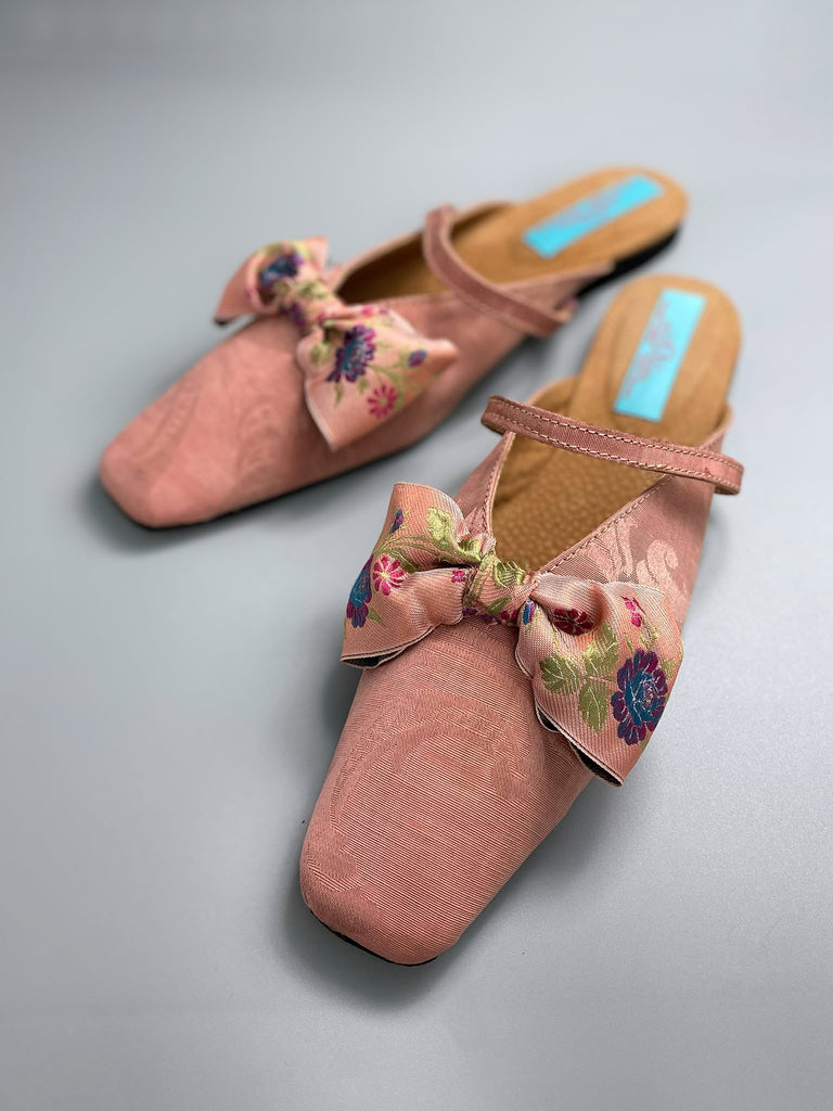 Salmon pink square toed silk damask shoes with floral ribbon bows. Bohemian styles created from antique textiles by the Pavilion Parade studio.