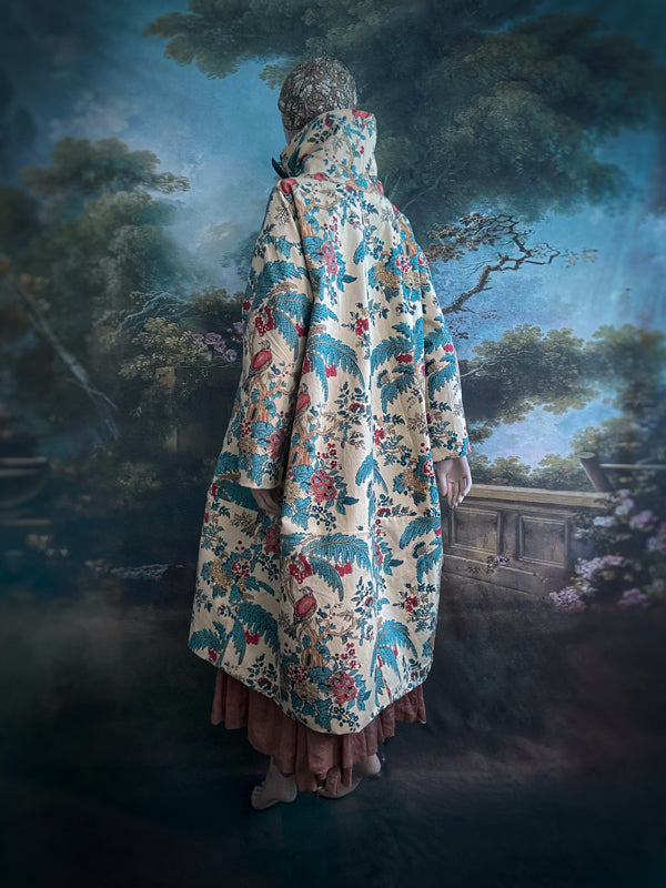 Funnel neck opera coat created from a vintage cotton Indienne featuring exotic birds and florals. Bohemian style created from vintage and antique textiles by Pavilion Parade