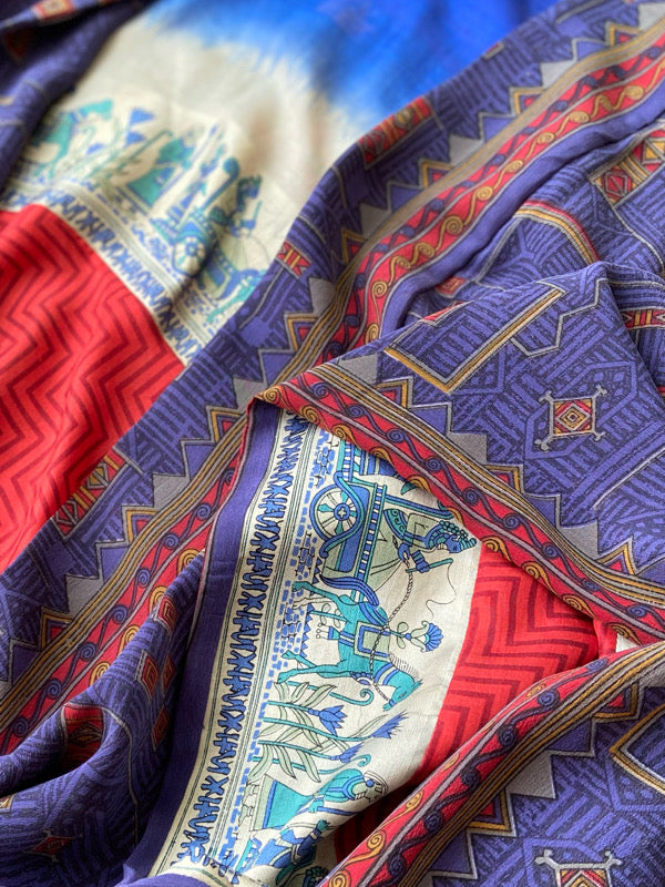 Egyptian Revival 1920s inspired full length robe created from vintage and antique textiles. Lapiz lazuli blue and scarlet silk crepe. Lined in block printed silk with design of ancient Egyptian figures, pyramids, chariots. Bohemian style from Pavilion Parade.