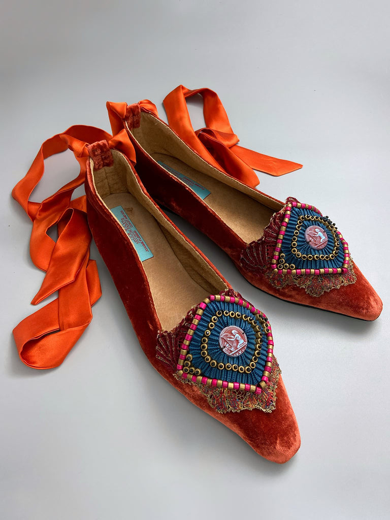 Silk velvet pointed toe slipper shoes with original 1920s Egyptian Revival embellishment and silk satin ankle ribbons. Bohemian styles created from antique textiles by the Pavilion Parade studio.