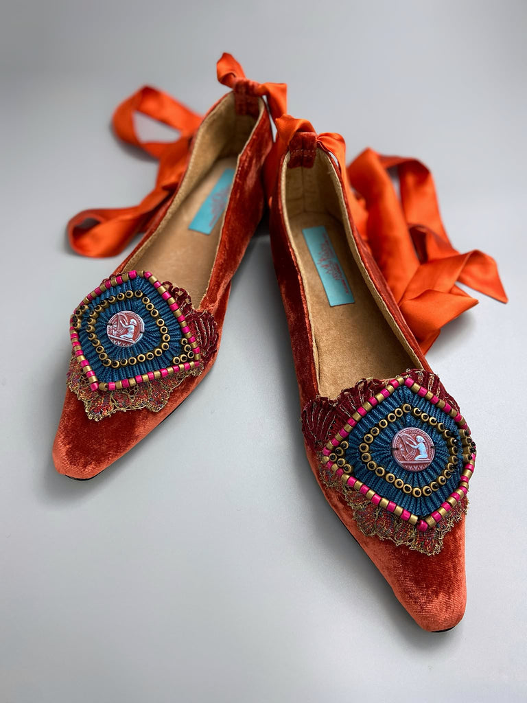 Silk velvet pointed toe slipper shoes with original 1920s Egyptian Revival embellishment and silk satin ankle ribbons. Bohemian styles created from antique textiles by the Pavilion Parade studio.