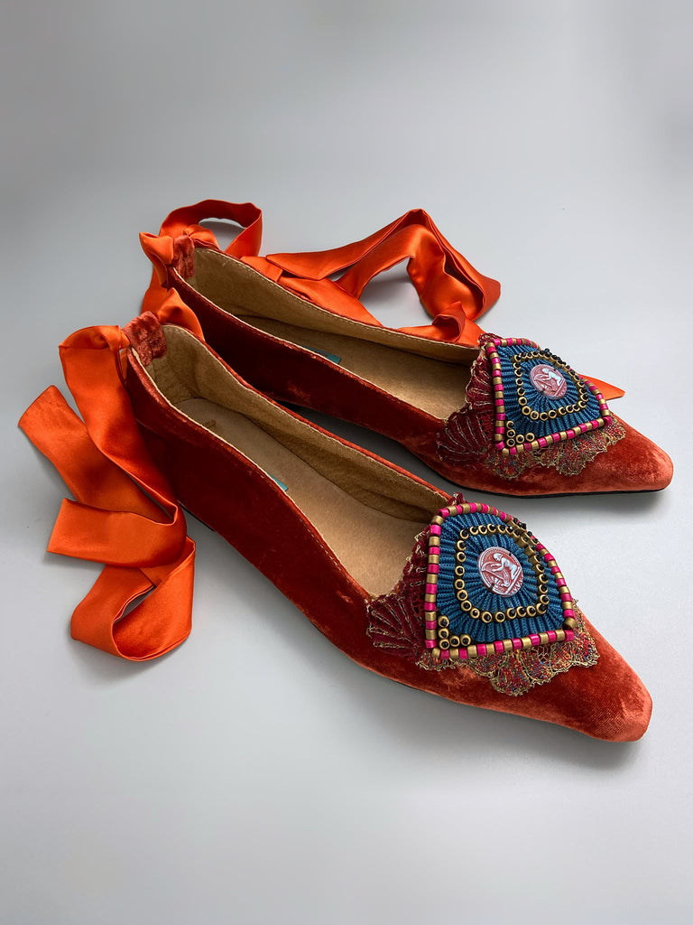 Silk velvet pointed toe slipper shoes with original 1920s Egyptian Revival embellishment and silk satin ankle ribbons. Bohemian styles created from antique textiles by the Pavilion Parade studio.