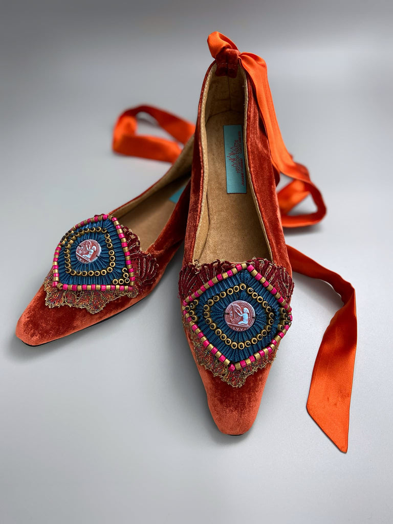 Silk velvet pointed toe slipper shoes with original 1920s Egyptian Revival embellishment and silk satin ankle ribbons. Bohemian styles created from antique textiles by the Pavilion Parade studio.