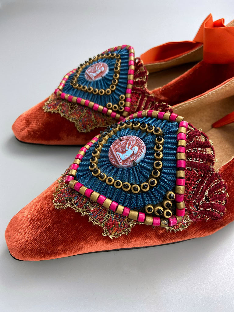Silk velvet pointed toe slipper shoes with original 1920s Egyptian Revival embellishment and silk satin ankle ribbons. Bohemian styles created from antique textiles by the Pavilion Parade studio.