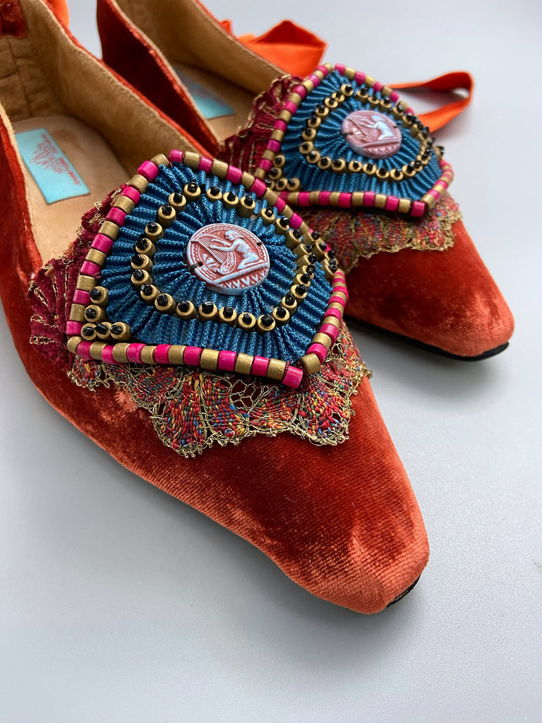 Silk velvet pointed toe slipper shoes with original 1920s Egyptian Revival embellishment and silk satin ankle ribbons. Bohemian styles created from antique textiles by the Pavilion Parade studio.