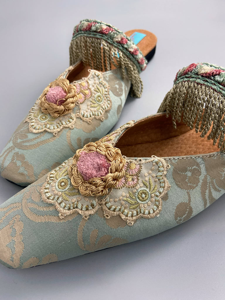 Duck egg blue square toed silk damask shoes with silk rosettes and tassel fringe. Bohemian styles created from antique textiles by the Pavilion Parade studio.