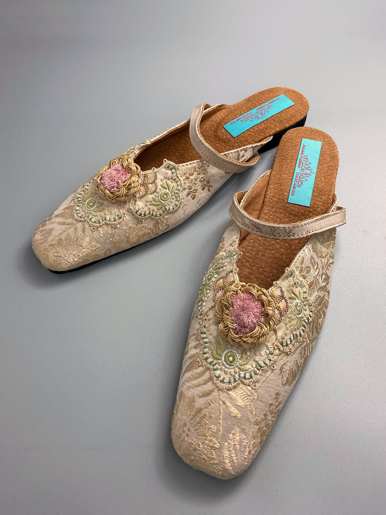 Rose gold square toed silk brocade shoes with silk rosettes. Bohemian styles created from antique textiles by the Pavilion Parade studio.