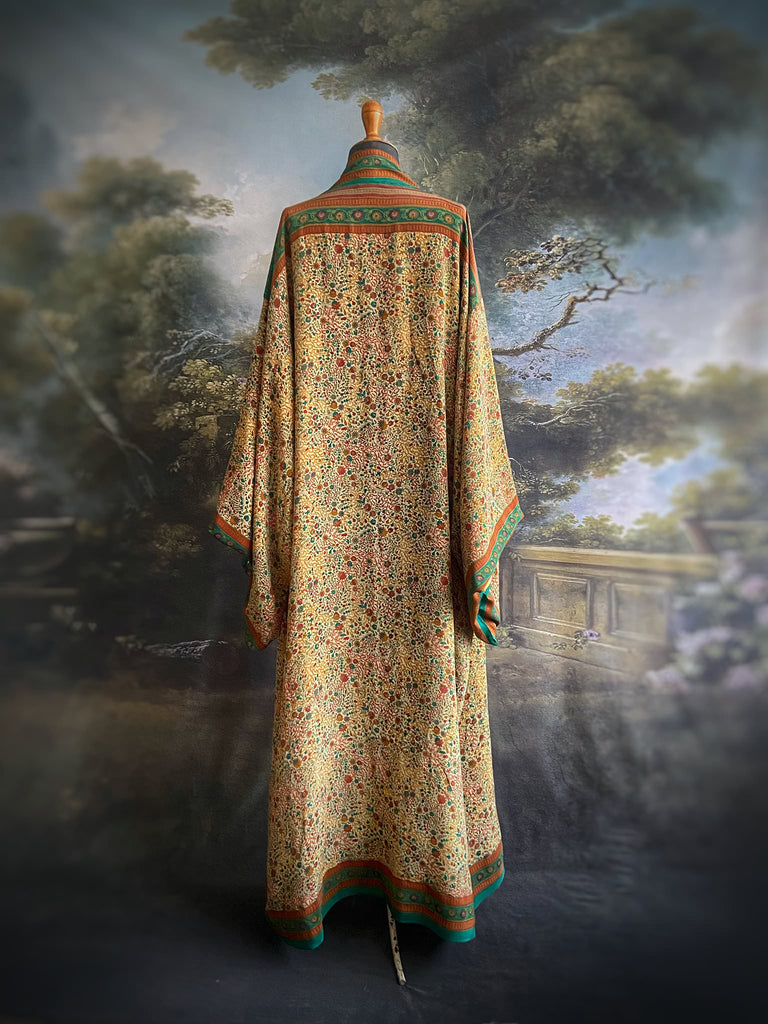 Emerald green and sand floral 1920s inspired silk kimono robe. Bohemian styles sustainably created from vintage textiles by the Pavilion Parade studio.