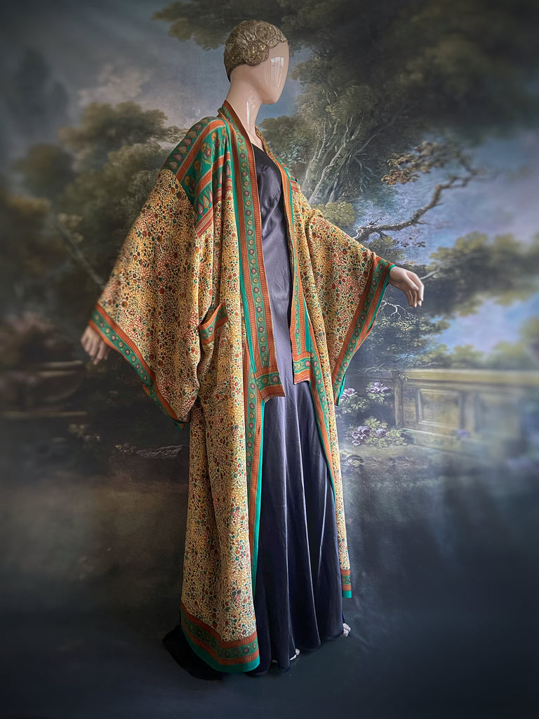 Emerald green and sand floral 1920s inspired silk kimono robe. Bohemian styles sustainably created from vintage textiles by the Pavilion Parade studio.