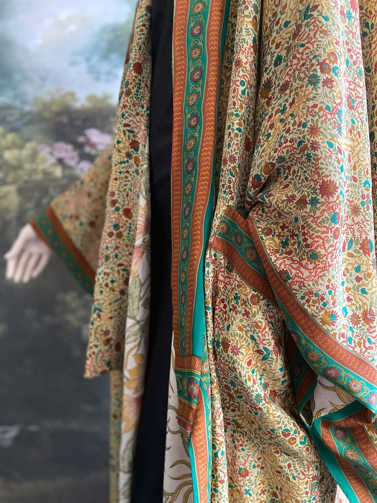 Emerald green and sand floral 1920s inspired silk kimono robe. Bohemian styles sustainably created from vintage textiles by the Pavilion Parade studio.