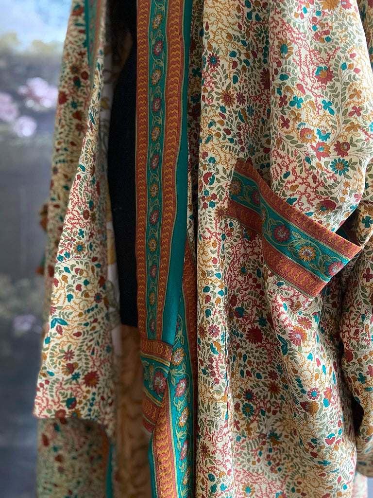 Emerald green and sand floral 1920s inspired silk kimono robe. Bohemian styles sustainably created from vintage textiles by the Pavilion Parade studio.