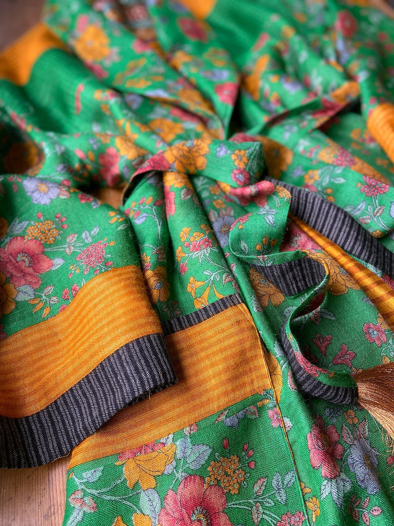 Emerald green and saffron yellow floral fine wool robe with silk lining. Wide sleeves, deep pockets and tassel sash. Unique bohemian style created from vintage and antique textiles by the Pavilion Parade studio.